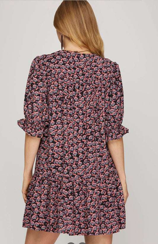 Bohemian-inspired tiered mini dress.