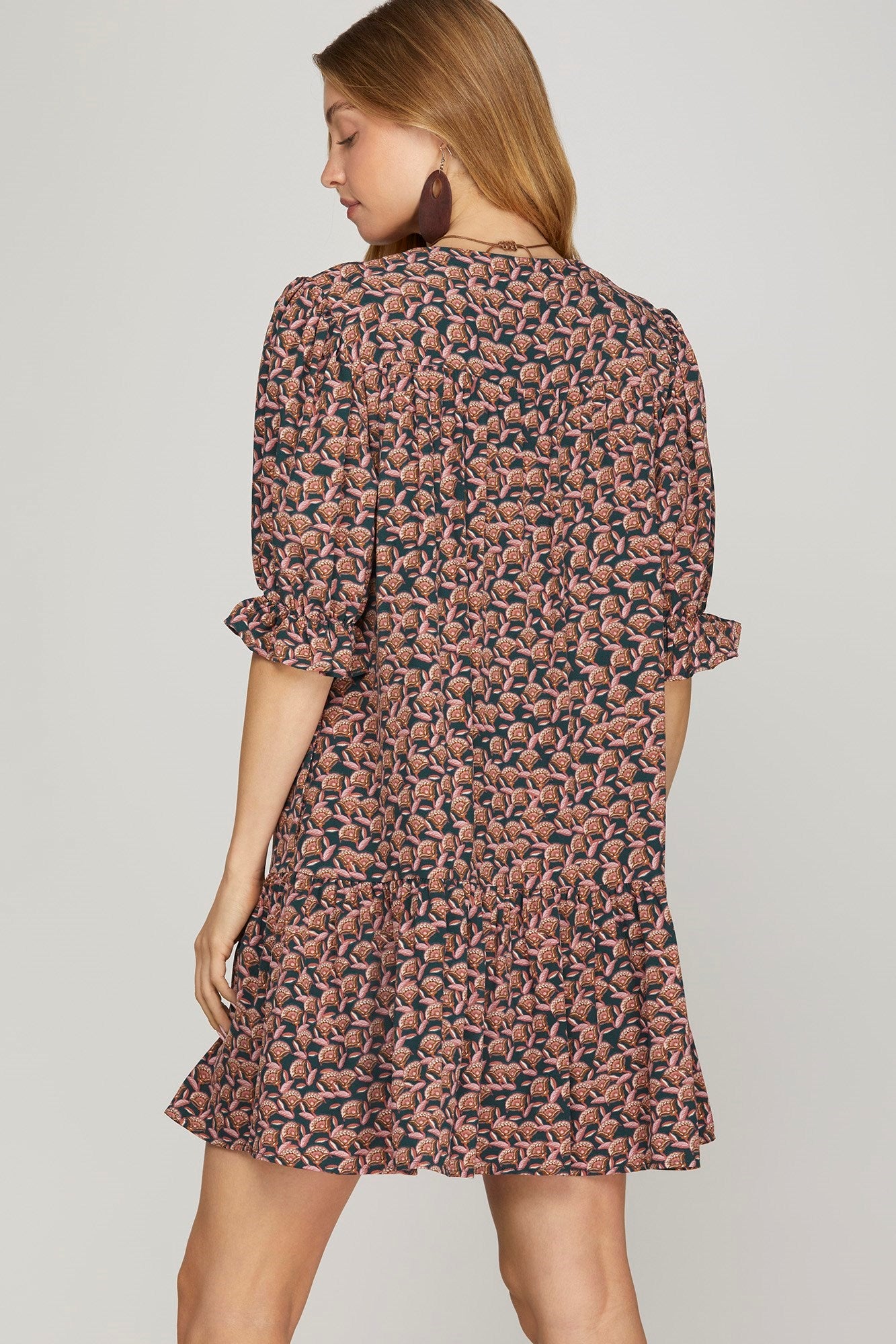 Bohemian-inspired tiered mini dress.