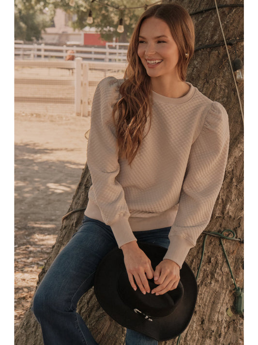 Embossing textured top with U-neck, long peasant sleeves, and ribbed hems