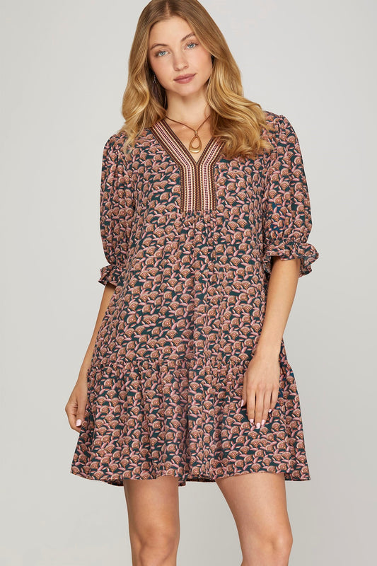 Bohemian-inspired tiered mini dress.